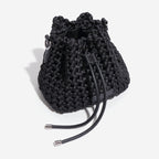 Black woven bucket bag on a white background
