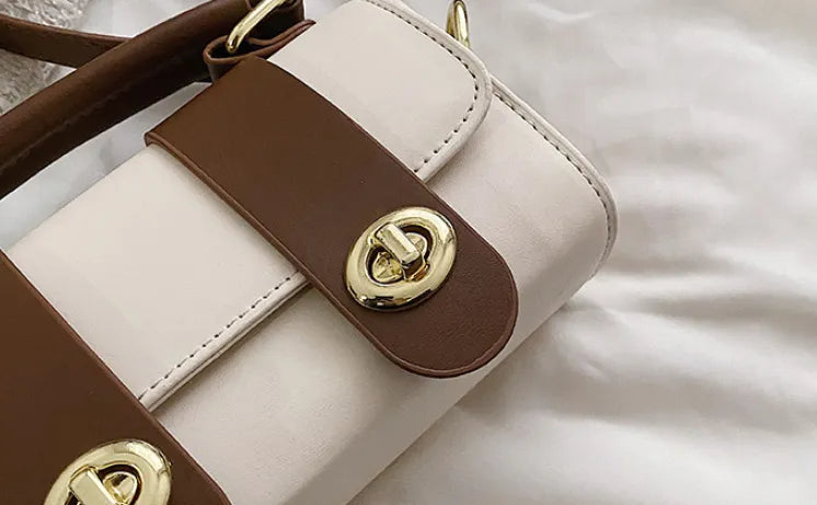 Handbag with brown and beige design on a light background